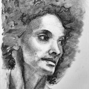 This is a black and white sketch of a woman’s face in profile view, with detailed shading highlighting her features, curly hair, and a calm expression. 