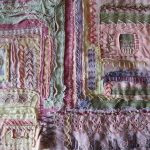 Multi coloured ethnic style stitched textiles