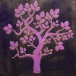 A purple stencil of a tree on black background board.