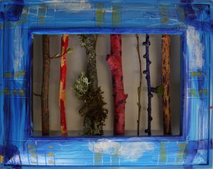 Painted branches in a blue frame