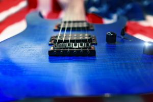 Close Up Blue Electric Guitar Music Instrument Rock With American Flag