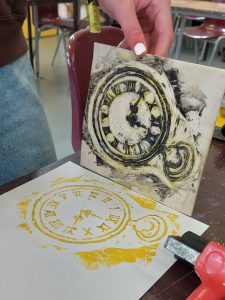 Yellow and black print of pocket watch