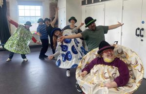 A group of circus and performing arts students dressed up in homemade costumes