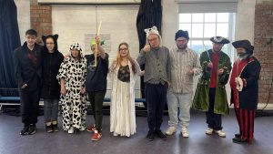 A group of drama students in costume